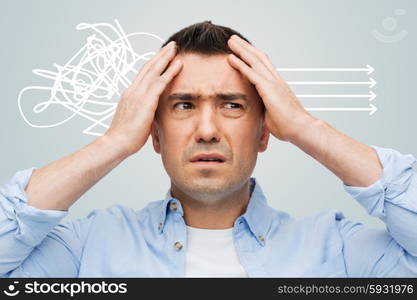 stress, headache, health care and people concept - unhappy man with closed eyes touching his forehead