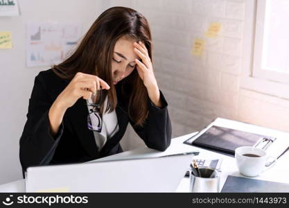 Stressed and depressed business woman working in office, Business failure concept