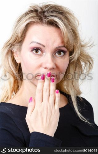 Stressed and worried blonde woman. Face emotion expression. Stressful worried upset blonde woman. Adult unhappy frightened female making hands gesture.