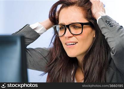 Stressed businesswoman overcharged with work in glasses