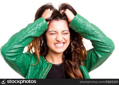 Stressed woman grabbing her hair in frustration