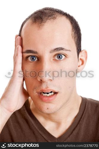 Stressed young man frustrated with something, isolated on white