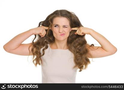 Stressed young woman closing ears