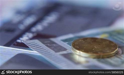 Strew Coins On Euro Banknotes, Shot Motorized Slider. HD RAW Video