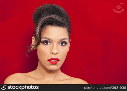 Striking young woman with red lipstick