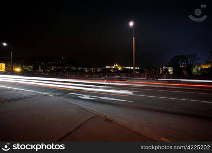 strip of passing cars on the street overnight