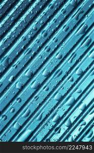 striped blue metallic material background with rain drops