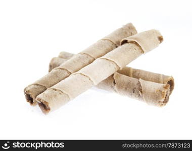 Striped wafer rolls . Striped wafer rolls filled with chocolate isolated on white