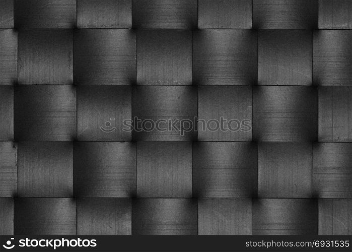 Stripes of scratched black leather weave pattern abstract squares background.