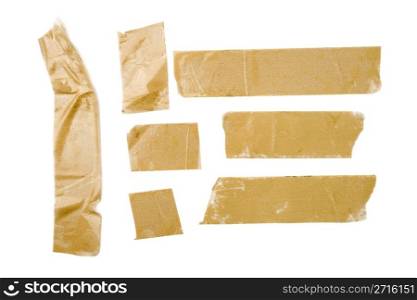Strips of brown adhesive packaging tape isolated on white background