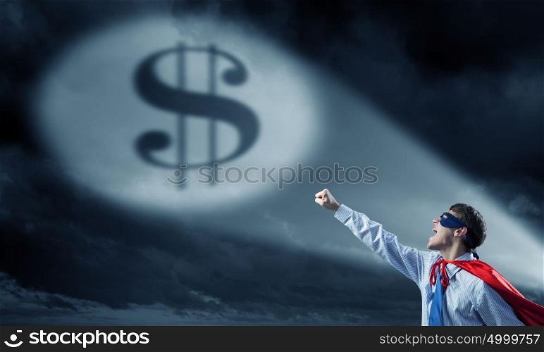 Strong and powerful as super hero. Young confident super businessman in mask and cape at night