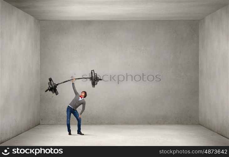 Strong and powerful. Confident man lifting above head sketched barbell
