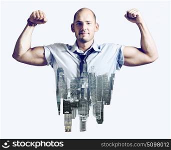 Strong businessman concept. Strong businessman double exposure concept. Business man showing muscular hands, mixed with city skyline