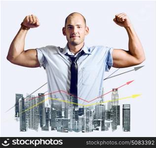 Strong businessman double exposure concept. Business man showing muscular hands, mixed with city skyline