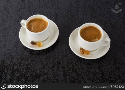 Strong coffee on black background. Strong coffee on black background. Coffee cup. Cup of coffee. Strong coffee. Morning coffee. Coffee break. Coffee mug. Strong coffee.