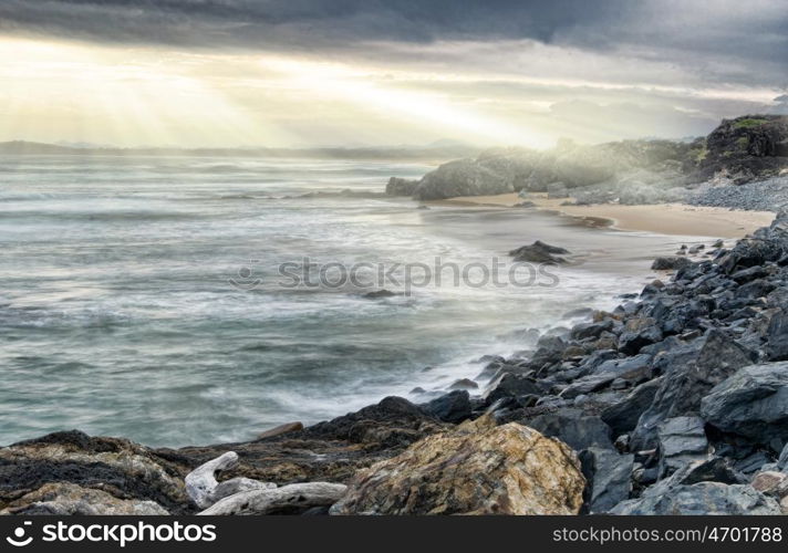 strong fine art image of a dark and dramatic coastline. dramatic coastline
