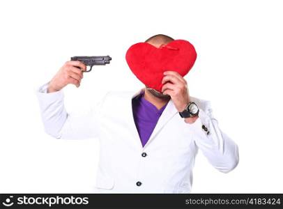 strong latino man 20-25 years with heart and pistol in studio on white background