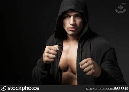 strong man fighter portrait isolated on black background