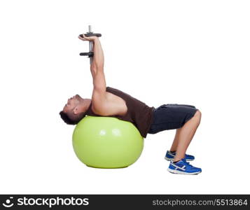 Strong man practicing exercises with dumbbells sit on a ball isolated on white background