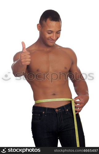 Strong man saying ok with a tape measure isolated on white