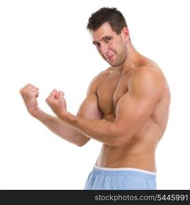 Strong sports man showing biceps