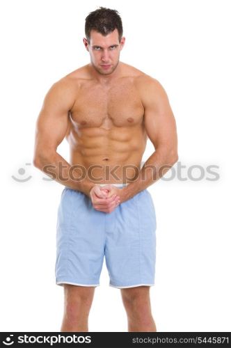 Strong sports man showing muscles