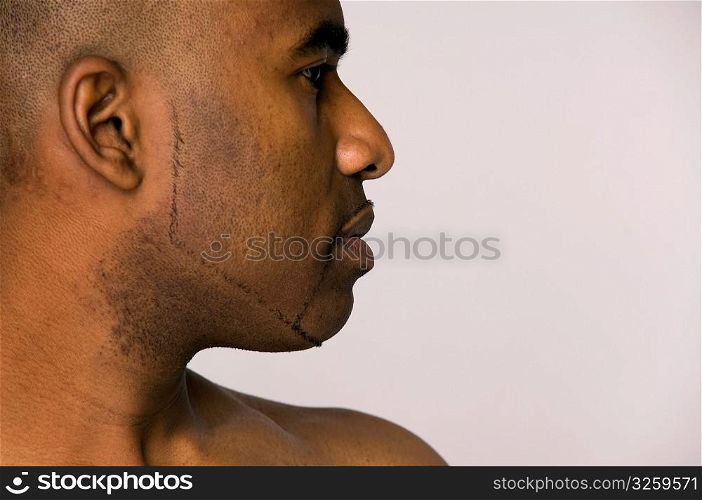 Strong stoic profile of African-American man.