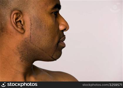 Strong stoic profile of African-American man.