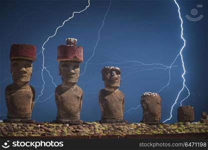 Strong thunder and powerful flashes of lightning. A statue on Easter Island or Rapa Nui in the southeastern Pacific, the territory of Chile.. statue on Easter Island or Rapa Nui in the southeastern Pacific