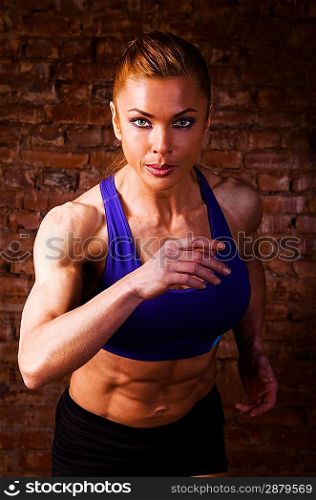strong woman is running on camera
