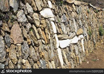 Structure of a Llama made on an old stone wall, Choquequirao, Inca, Cusco Region, Peru