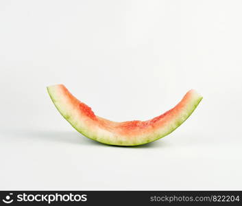 stub of red ripe round watermelon on a white background, close up