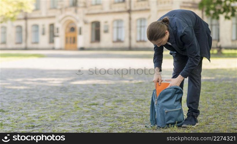student and backpack