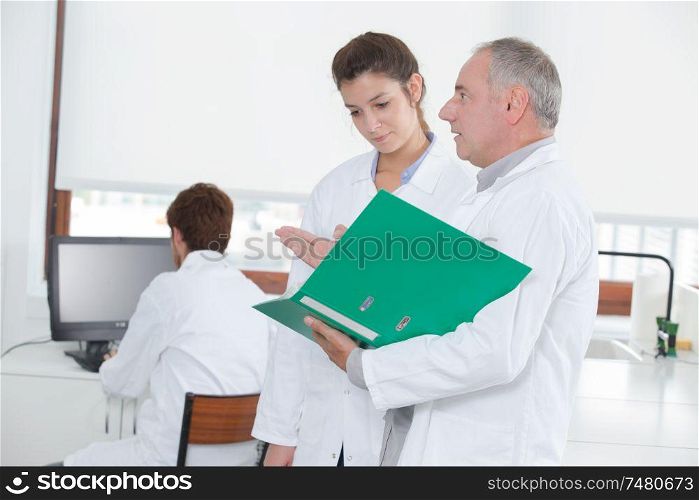 student and teacher in biology training course