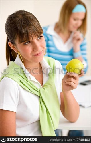 Student at home - happy woman with apple, study together