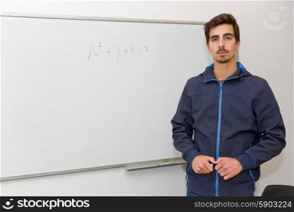 student at the school, on the whiteboard