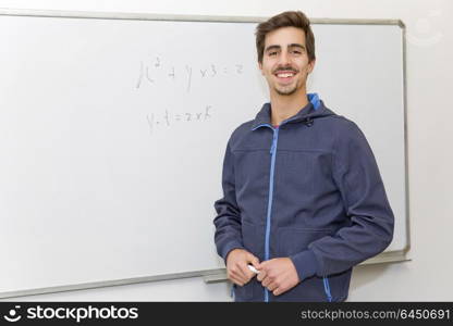 student at the school, on the whiteboard