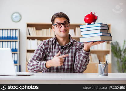 Student breaking piggybank to pay for tuition fees