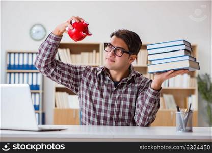 Student breaking piggybank to pay for tuition fees