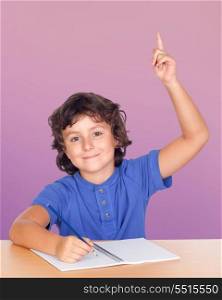 Student child asking to speak isolated on a over pink background