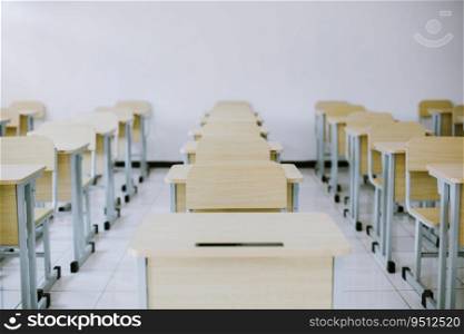Student desks and chairs are arranged neatly in the classroom