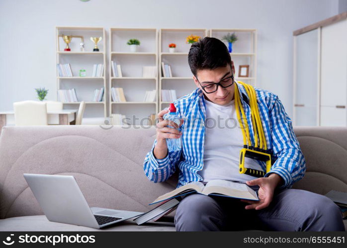 Student exercising while preparing for exams