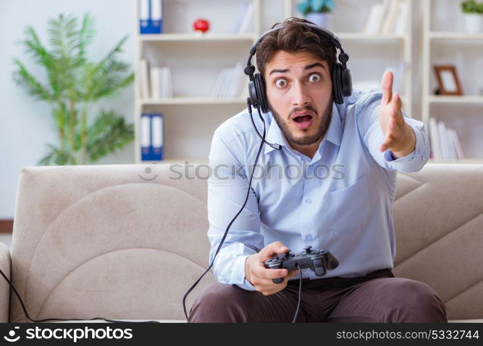 Student gamer playing games at home