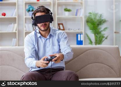 Student gamer playing games at home. The student gamer playing games at home