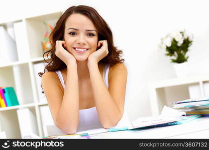 Student girl studying her lessons at home