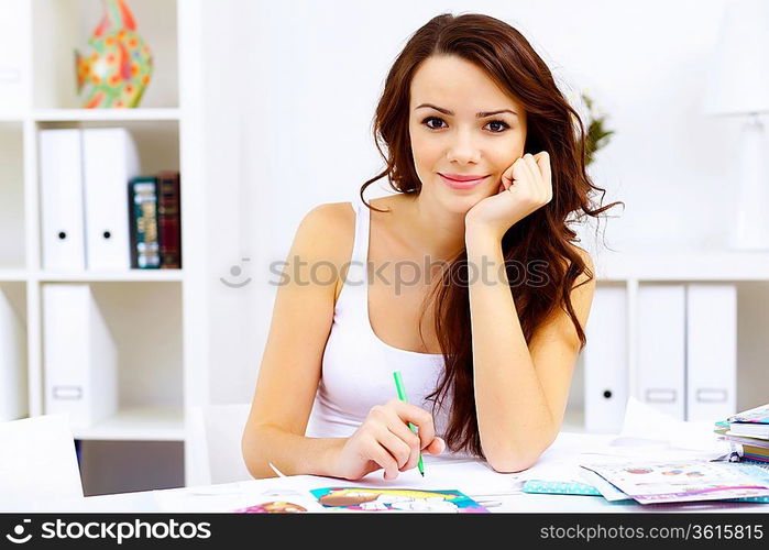 Student girl studying her lessons at home