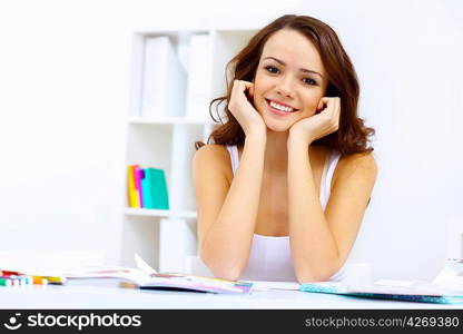 Student girl studying her lessons at home