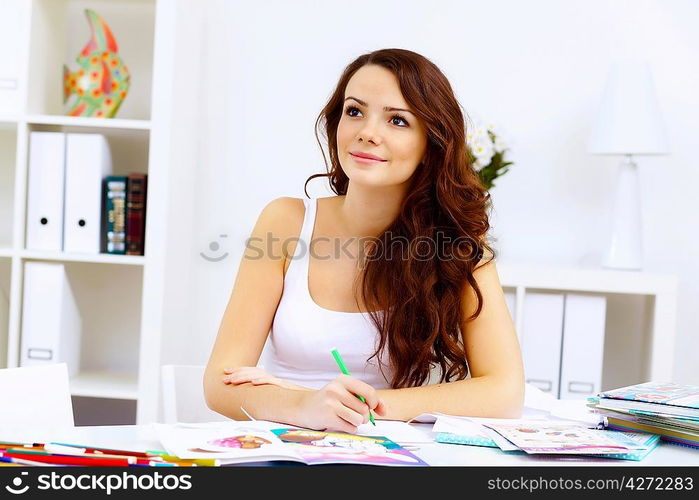 Student girl studying her lessons at home