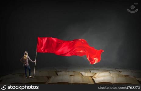 Student girl waving flag. Young girl in casual with blank waving flag in hand