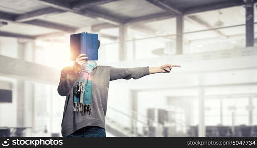 Student girl with book in hands. Young hipster girl with opened book in hands